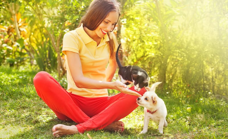 woman-with-puppy-and-kitten-min